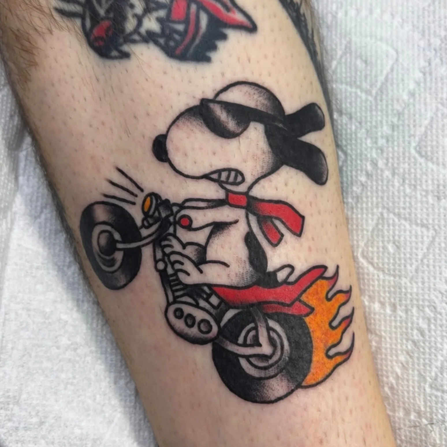 Super cute Snoopy tattoo by @maxwellfrancistattoo