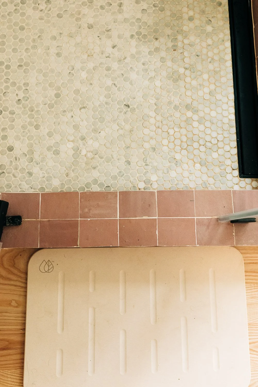 Tile and material transition detail showing tile, wood floor, and finish coordination in nc mountain kitchen remodel