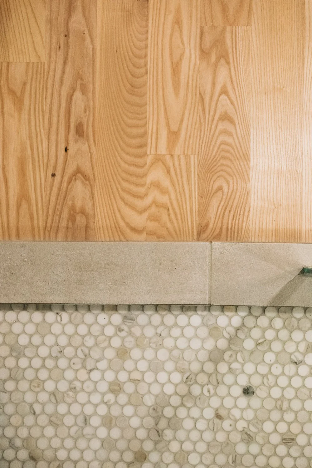 Tile and material transition detail showing tile, wood floor, and finish coordination in nc mountain kitchen remodel