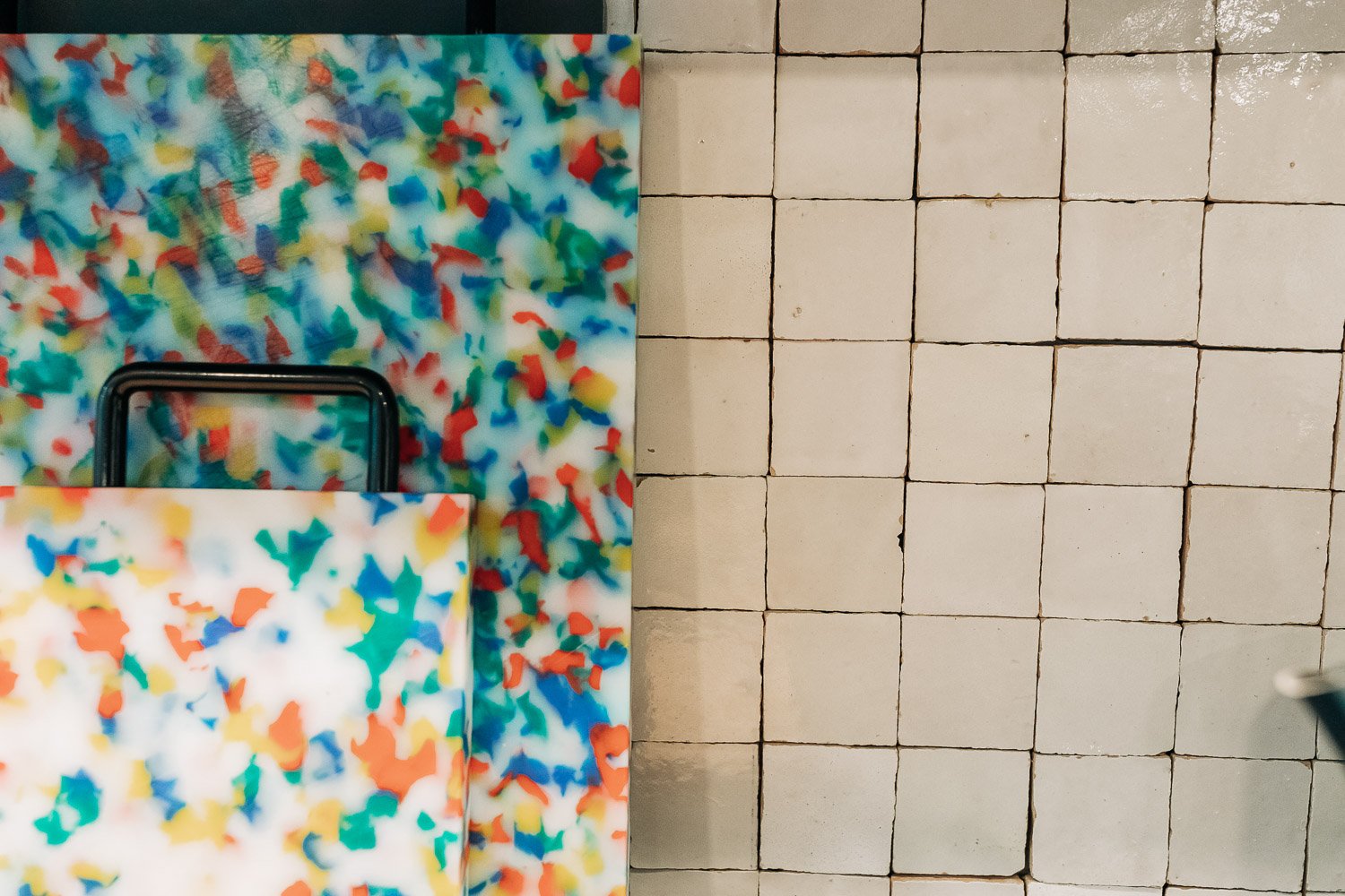 Tile and material transition detail showing backsplash, wood cabinetry, and finish coordination in mountain kitchen remodel