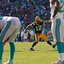 Rodgers fooled the Dolphins defense with a fake spike, and then tossed a game-winning touchdown pass.