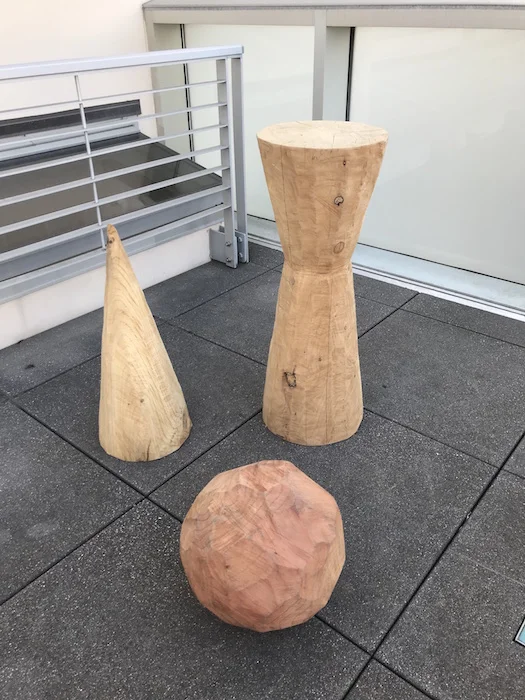 Chainsaw carving Hour glass: 14 x14 37” Cone : 12 x 12 X 30 Faceted ball: 14” diameter