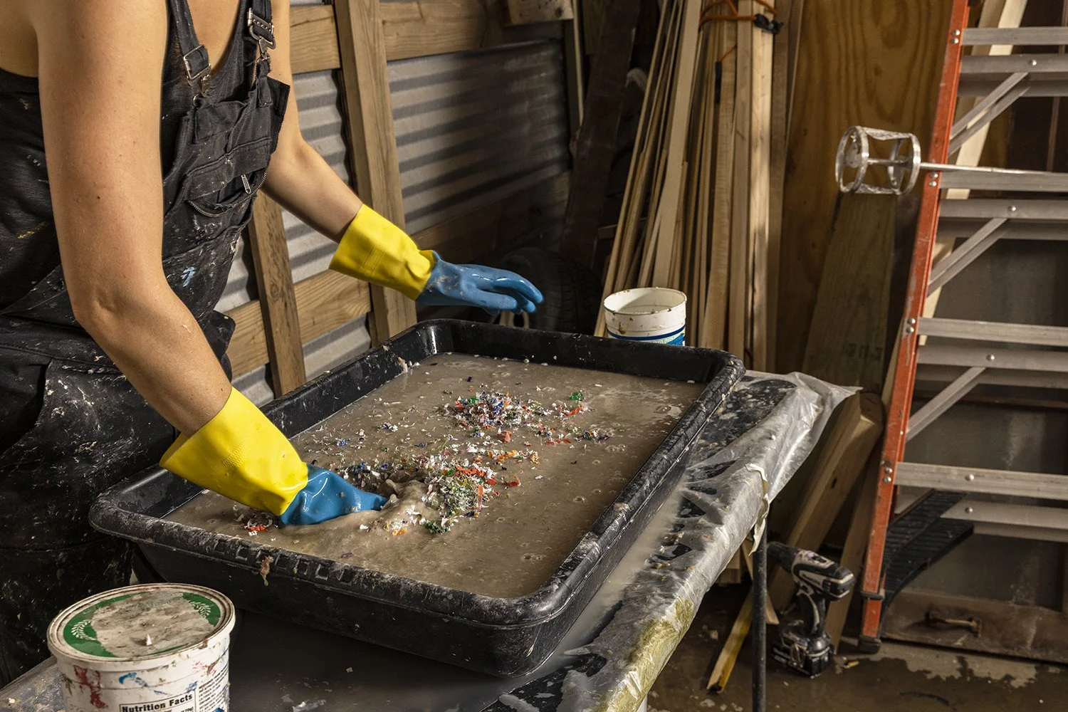 web_papermaking1_adding_plastic_hogging_vat.jpg