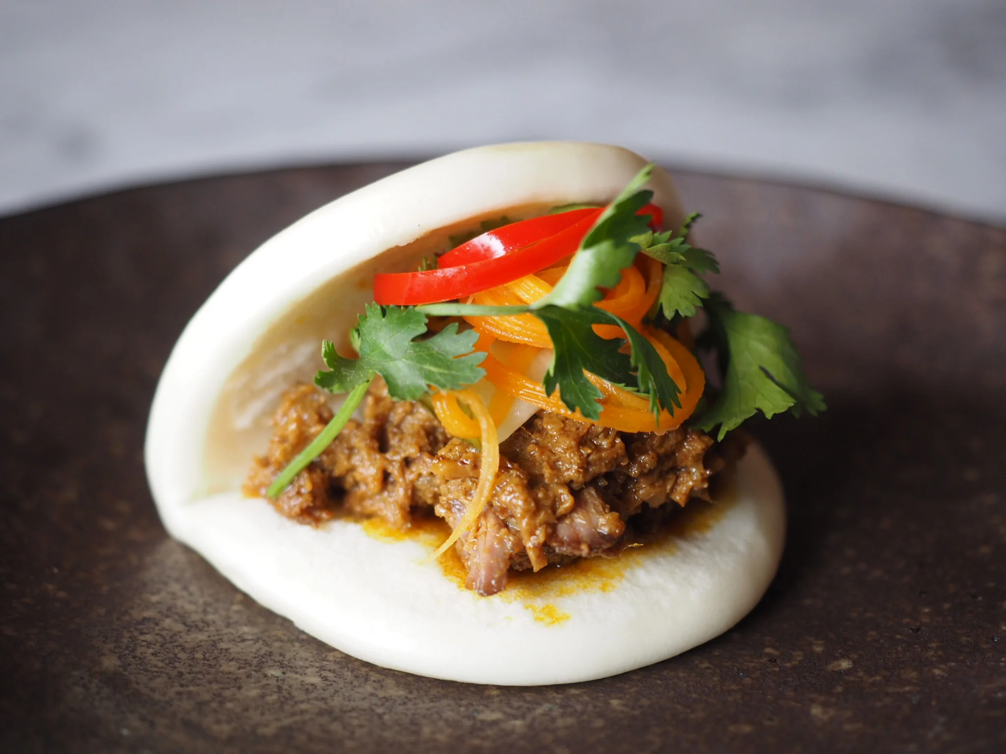 Beef Rendang Bao with Pickled Carrots and Cucumber