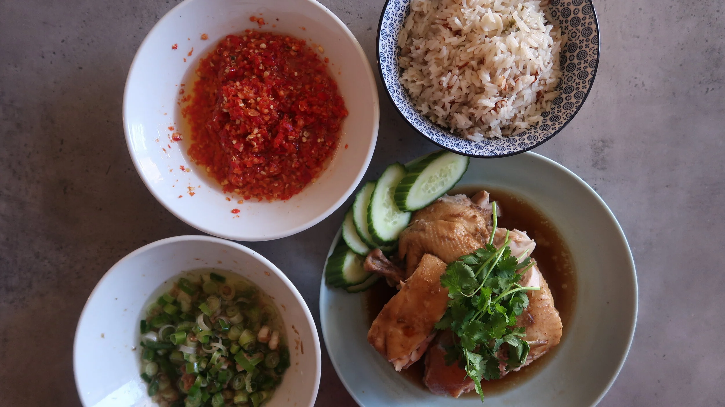 Hainanese Chicken Rice- Poached Chicken with Seasoned Rice