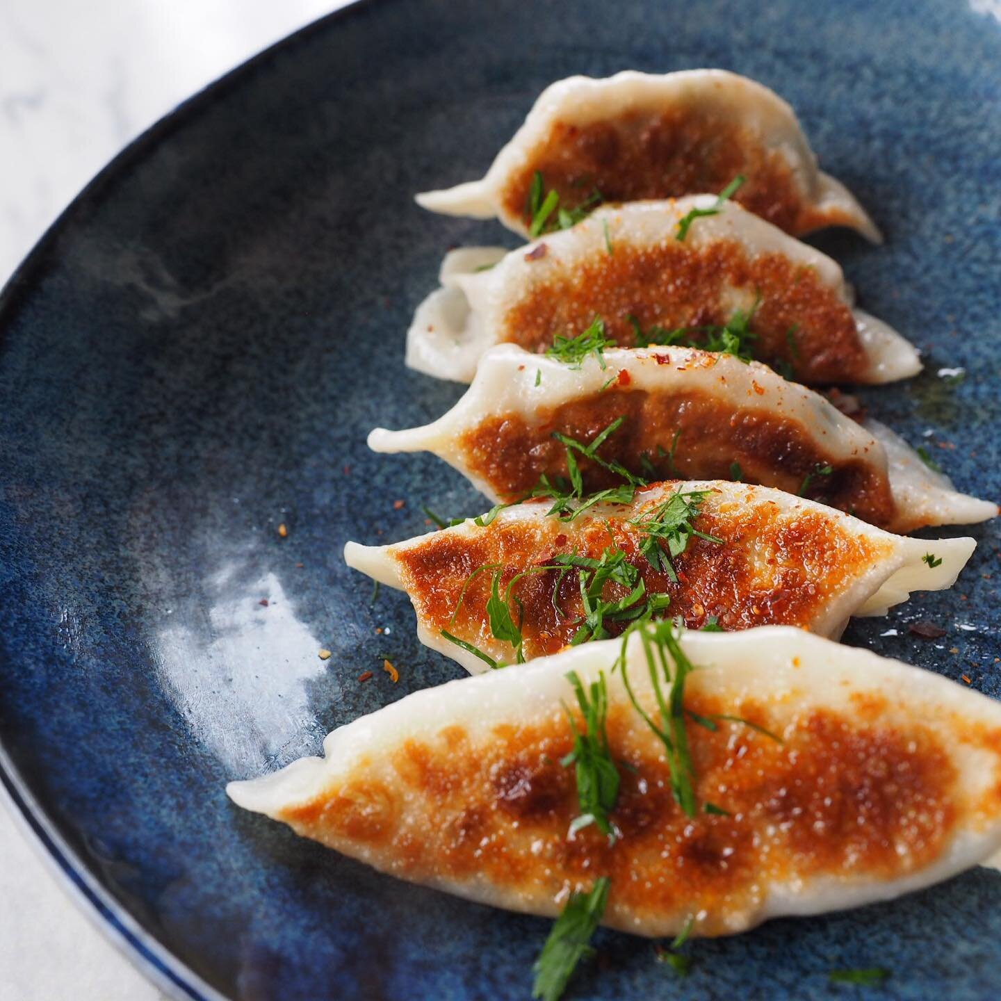 Dough parcels with some sort of filling aka dumplings 🥟. We filled this one with Italian sausage, mushroom, parsley and cream &amp; drizzled with homemade chilli and garlic oil..... delicious 🤤🤤