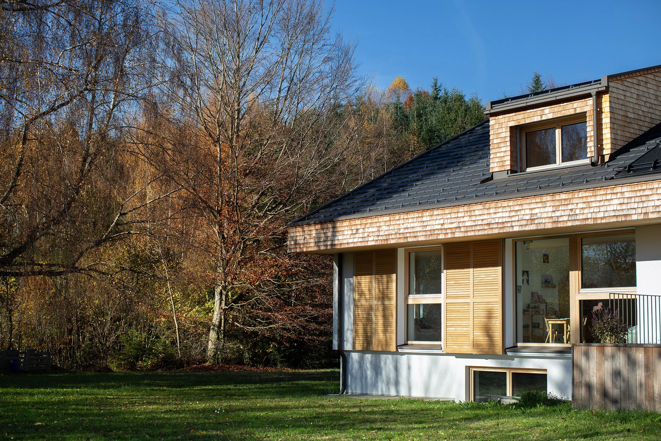 fassade-holz-schiebeladen-vorarlberg-umbau.jpg