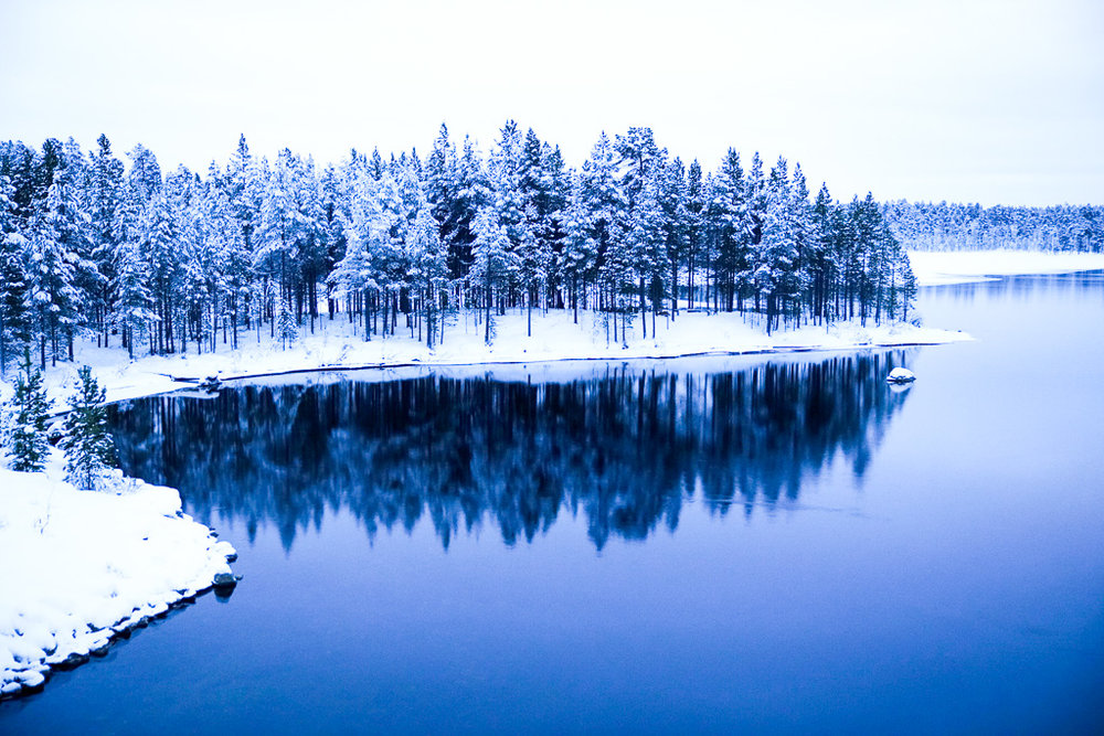 Lake reflection lapland Russian border.jpg