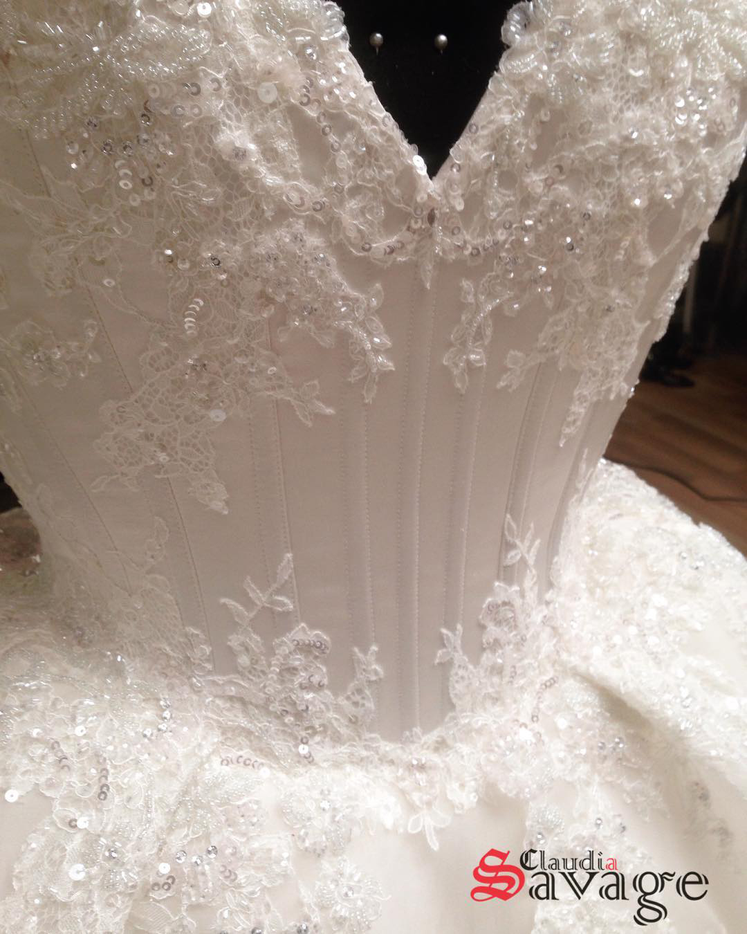 Layered lace details that covered the corset bodice and gown.