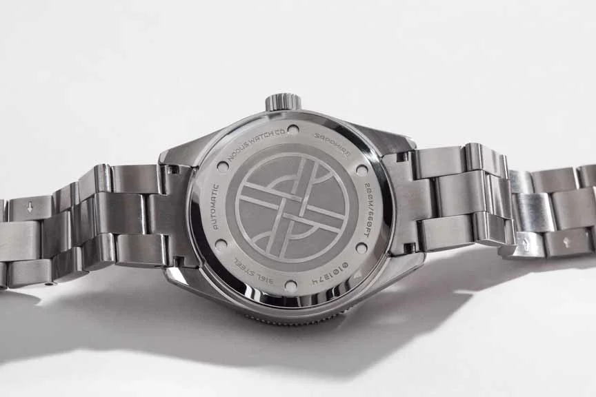The Trieste caseback is lightly etched to keep the overall height as thin as possible