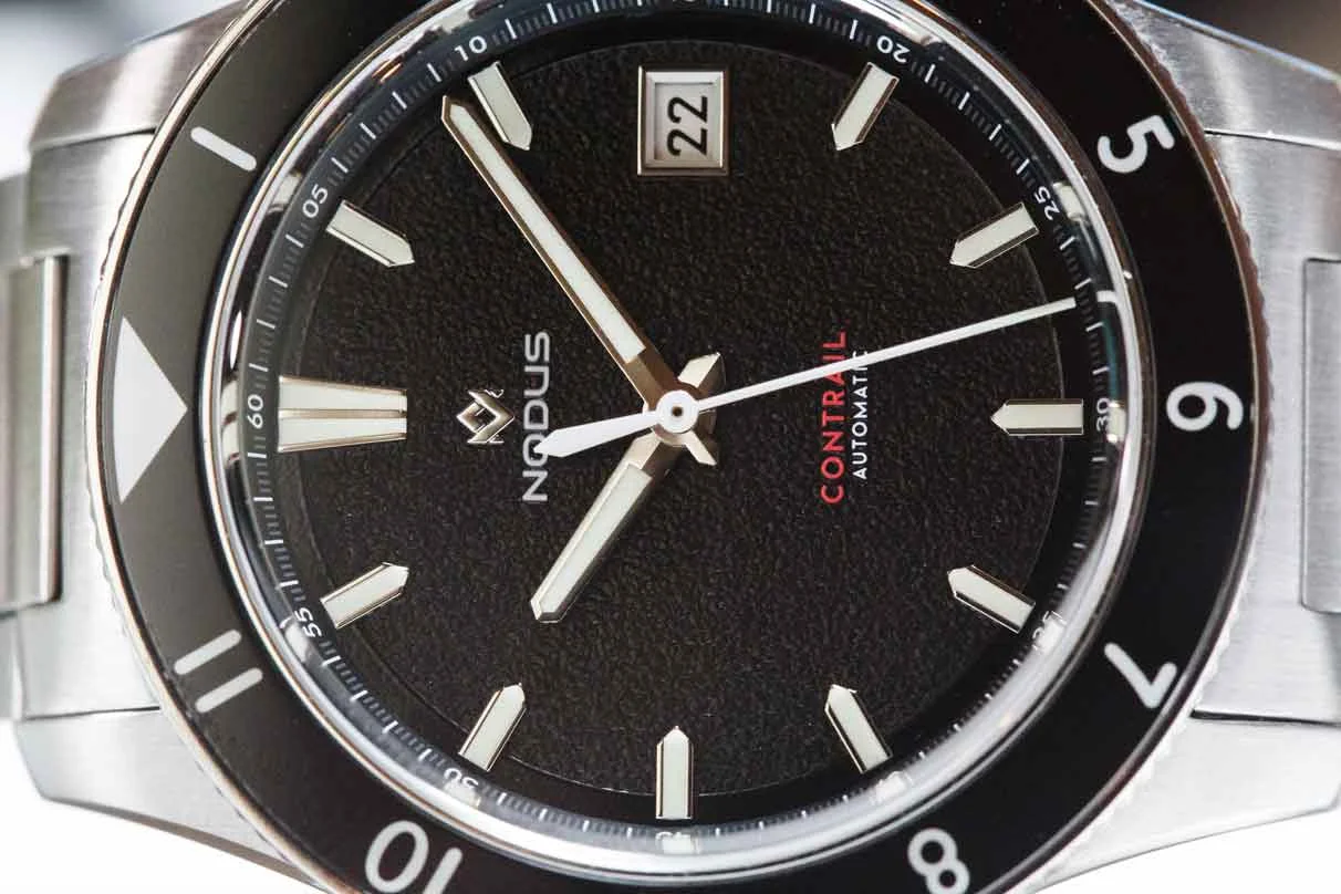 Our take on baton hands: they taper ever-so-slightly from the base to a point at the ends. The pilot-style seconds hand just seemed to fit right in.