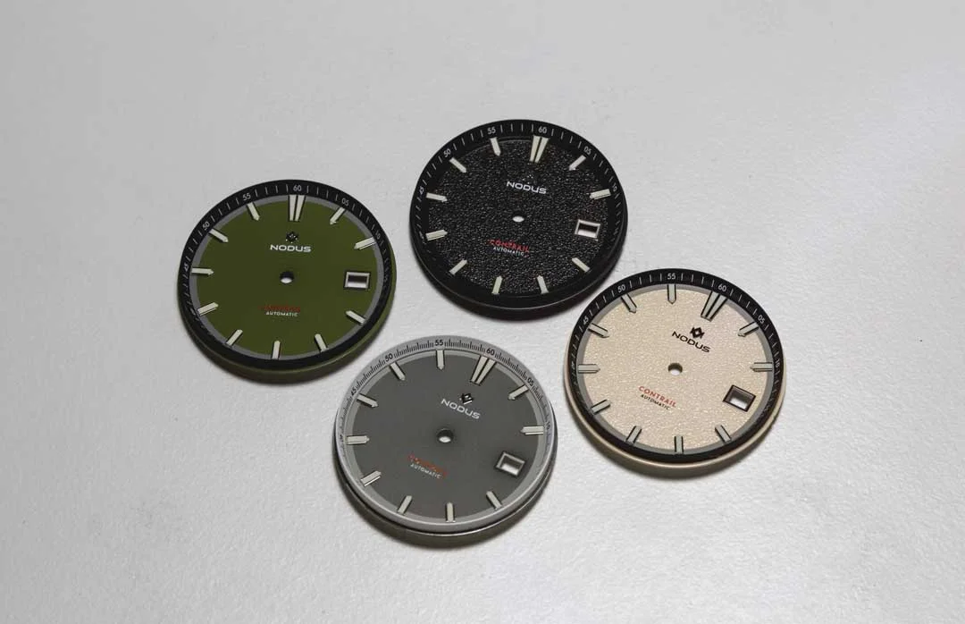 We inspect dials for marks, scratches on polished surfaces, lume inconsistencies, and index alignment.