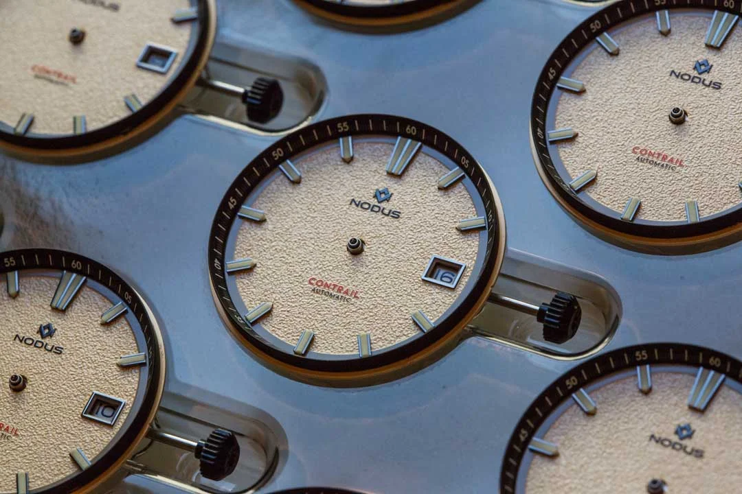 Dials are affixed onto the movement before hand installation takes place.