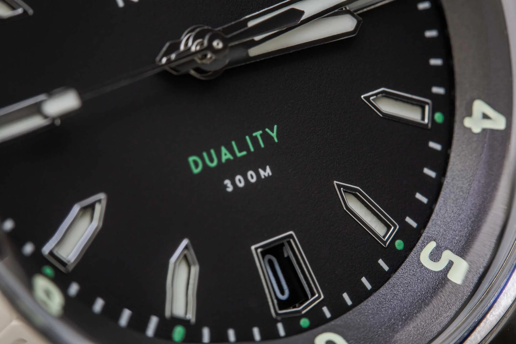 The hybrid dial - a construction that benefits from the night time visibility of a sandwich dial and daytime visibility of an applied dial.