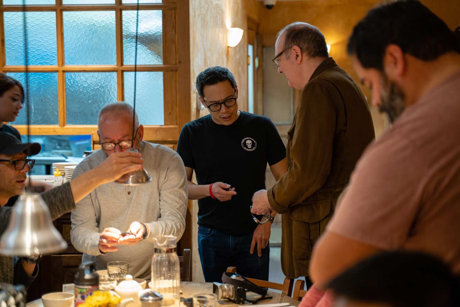 Bill Yao talking to a customer about one of his watches.