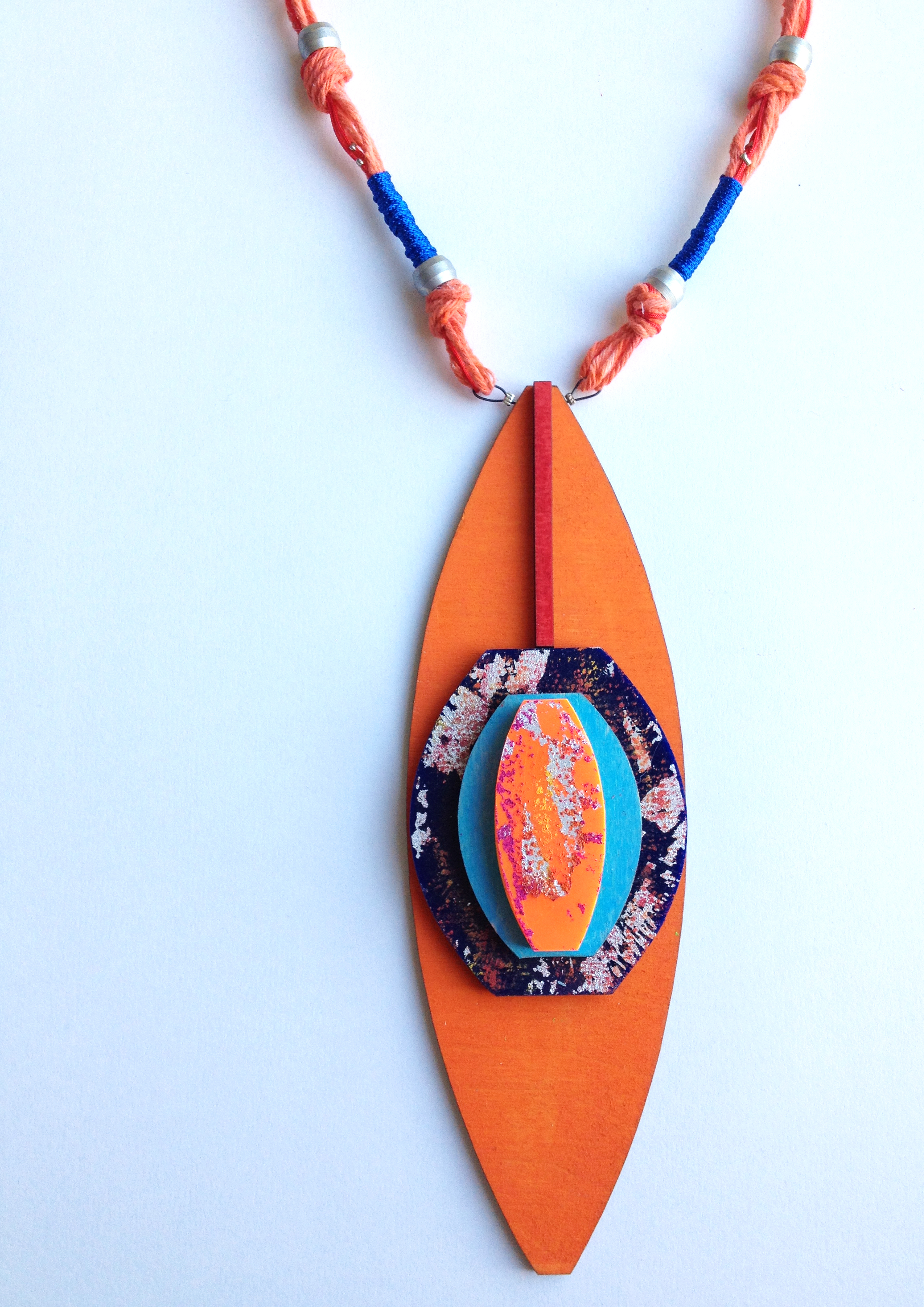 HannahMiles-african sky and dust neckpiece-lasercut pine,acrylic,printedfoiling,dyedstring,painted jump rings,crimp beads-necklace pendant dimensions 21cmx6.5cm, total length of piece inculding cording 42cm.jpg