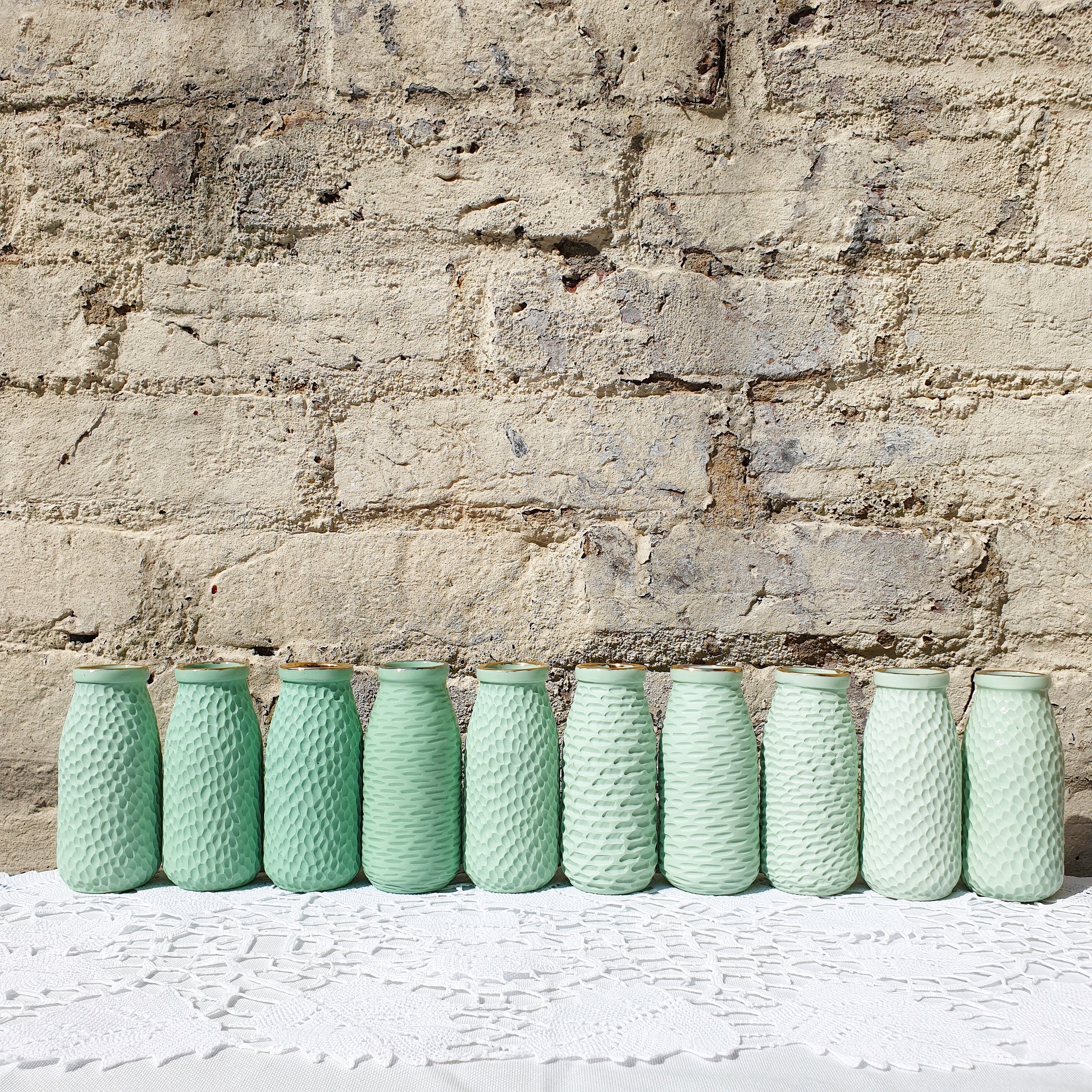 Clara Castner bottle vases.jpg