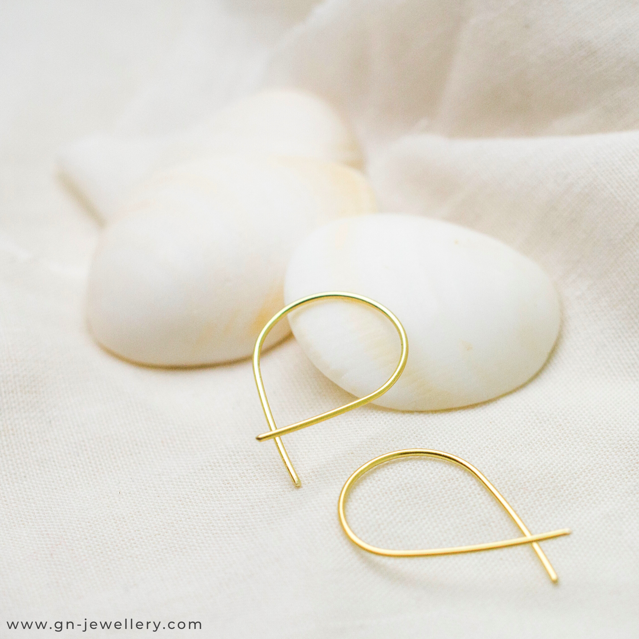 GN Jewellery-gold-ear-threaders.png