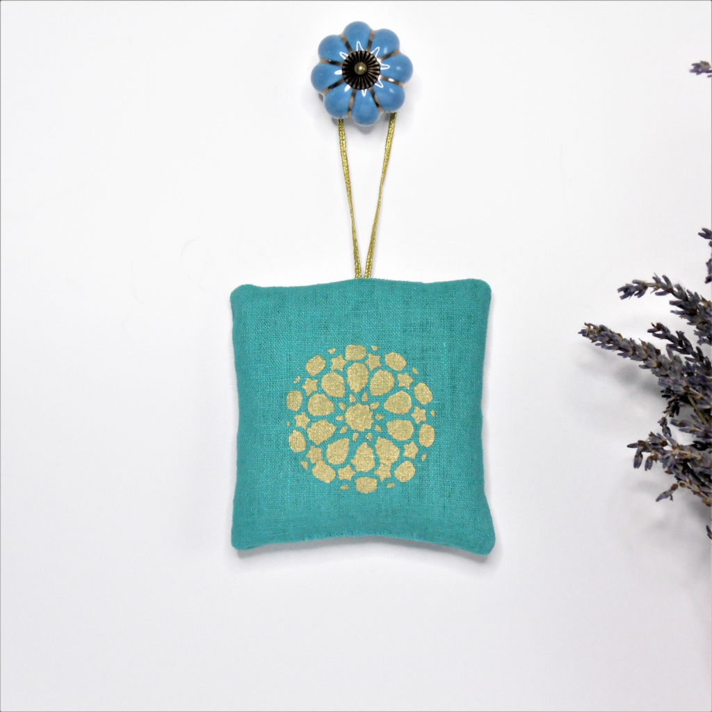 turquoise gold sachet.png