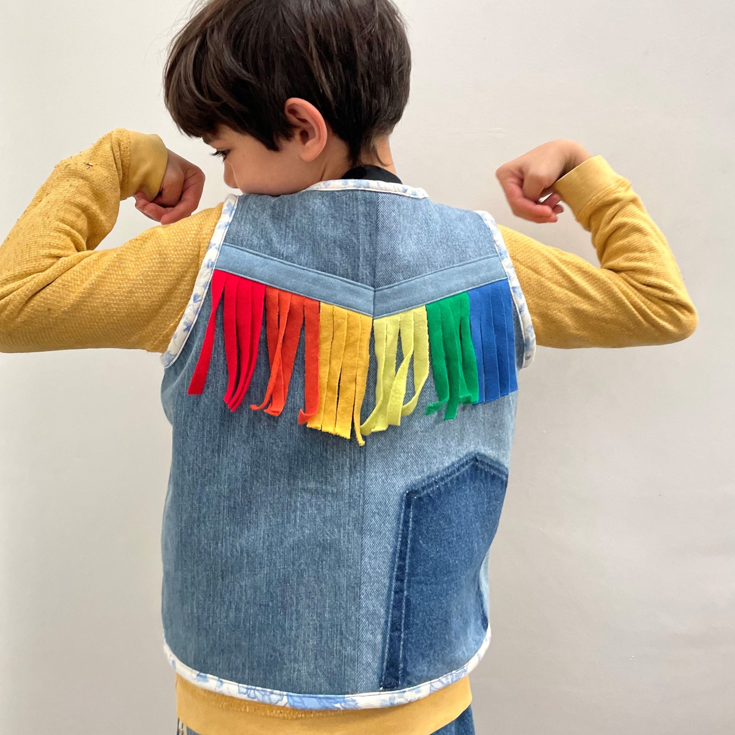 Kids recycled denim rainbow fringe vest.jpg