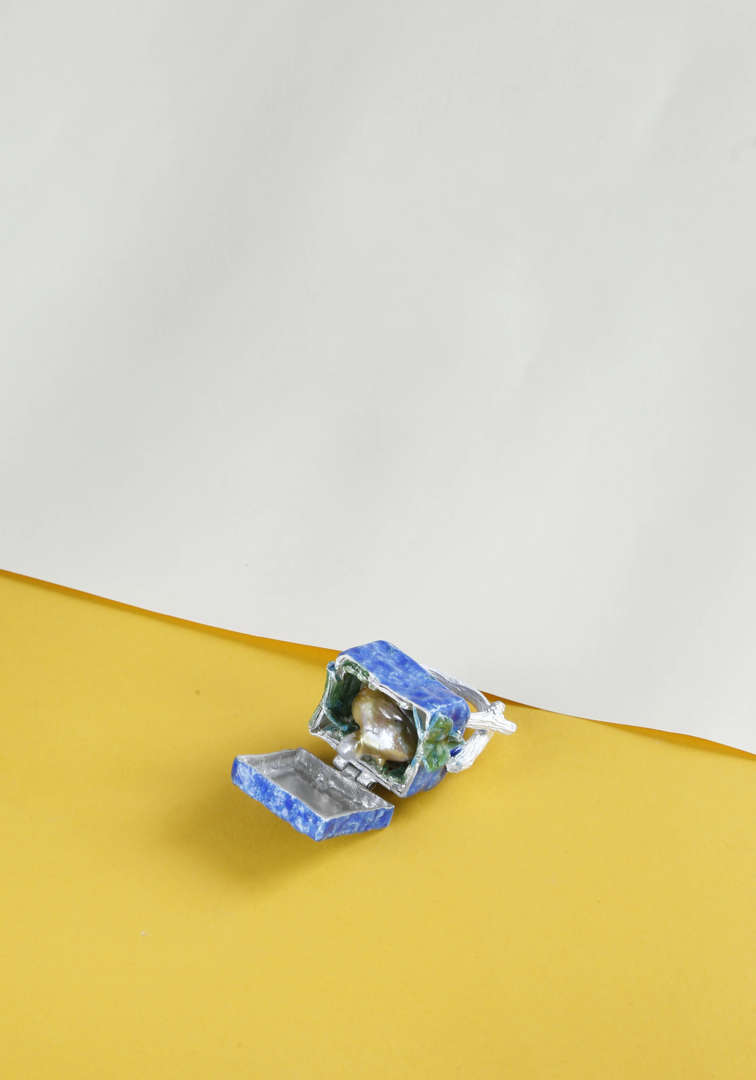 The Brick ring, 2016; fine silver, vitreous enamel, one baroque freshwater pearl.