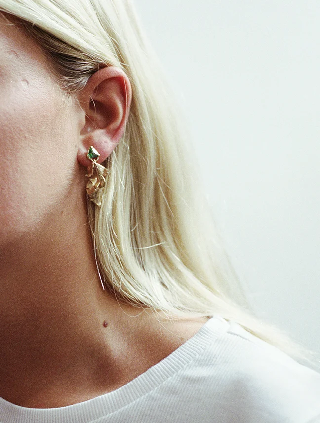 topaz and gold earrings worn.jpg