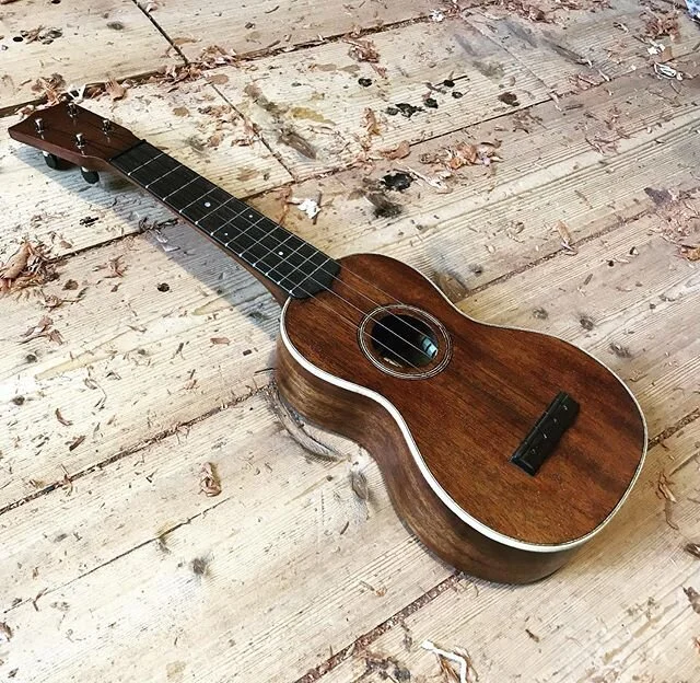The fretless fingerboard extension on my 12 fret ukes has become a signature feature, and obviously I think it looks cool.
But if you'd rather not have it, I'm very happy to make yours without. Just ask! I won't be offended, I promise.
#custommade 
#