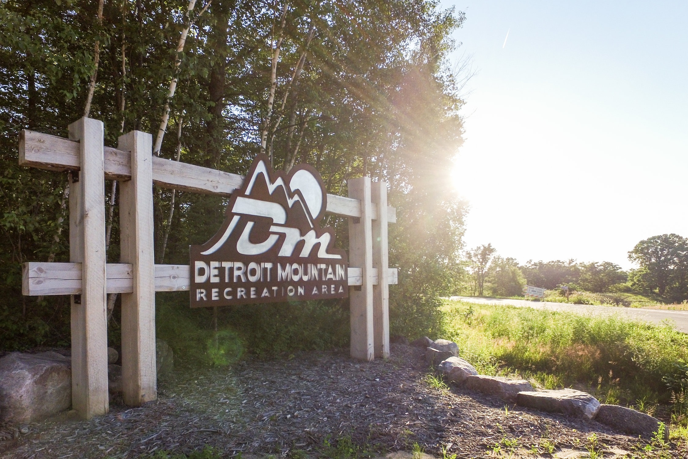 Detroit Mountain Recreational Area has hiking and biking trails in addition to ski and snowboard runs. This sign was designed with goals of matching the natural environment that surrounds it.