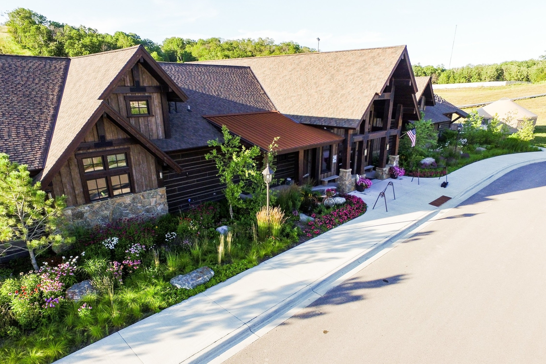 The lodge is surrounded by native grasses, trees and perennials. 