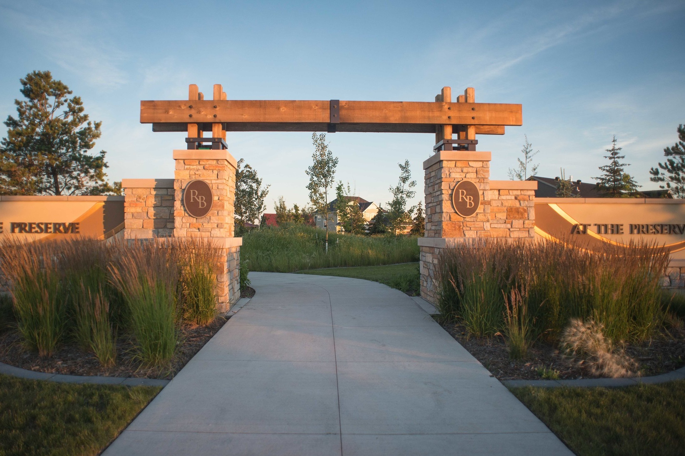 The project goal was to preserve the integrity of the site's stand of riparian forest while creating a one of a kind setting for an upscale housing project.