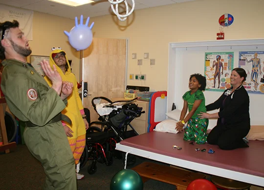 On the Badger Friday visit before Halloween weekend, UW football players Vince Biegel and Leo Musso spent part of their pregame ritual dressing up and playing games with patients at the children's hospital