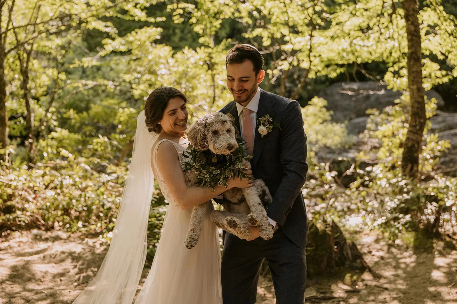 Beth and James Embracing Dog.jpg