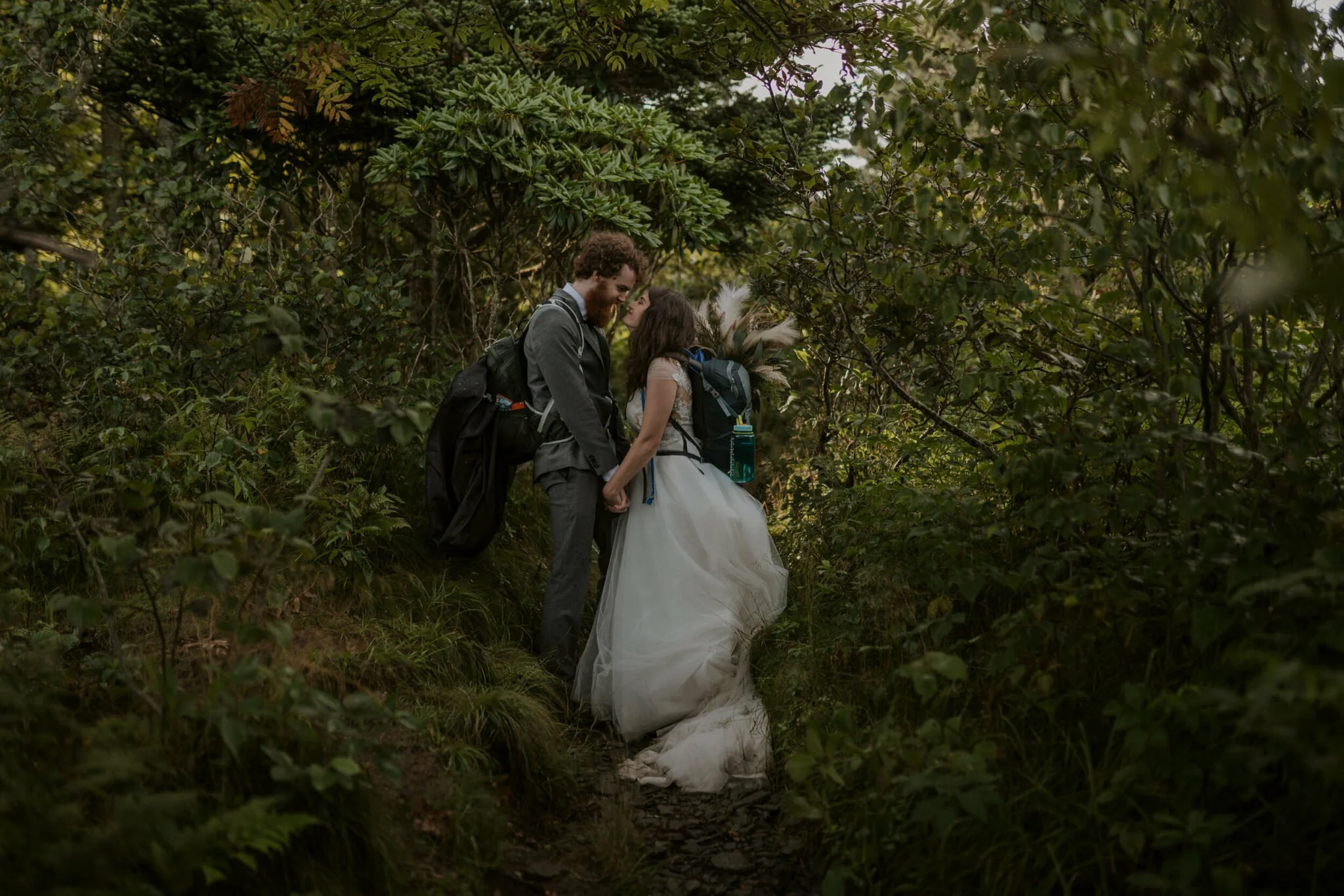 Mountain Elopement Kiss in the Bushes.jpg