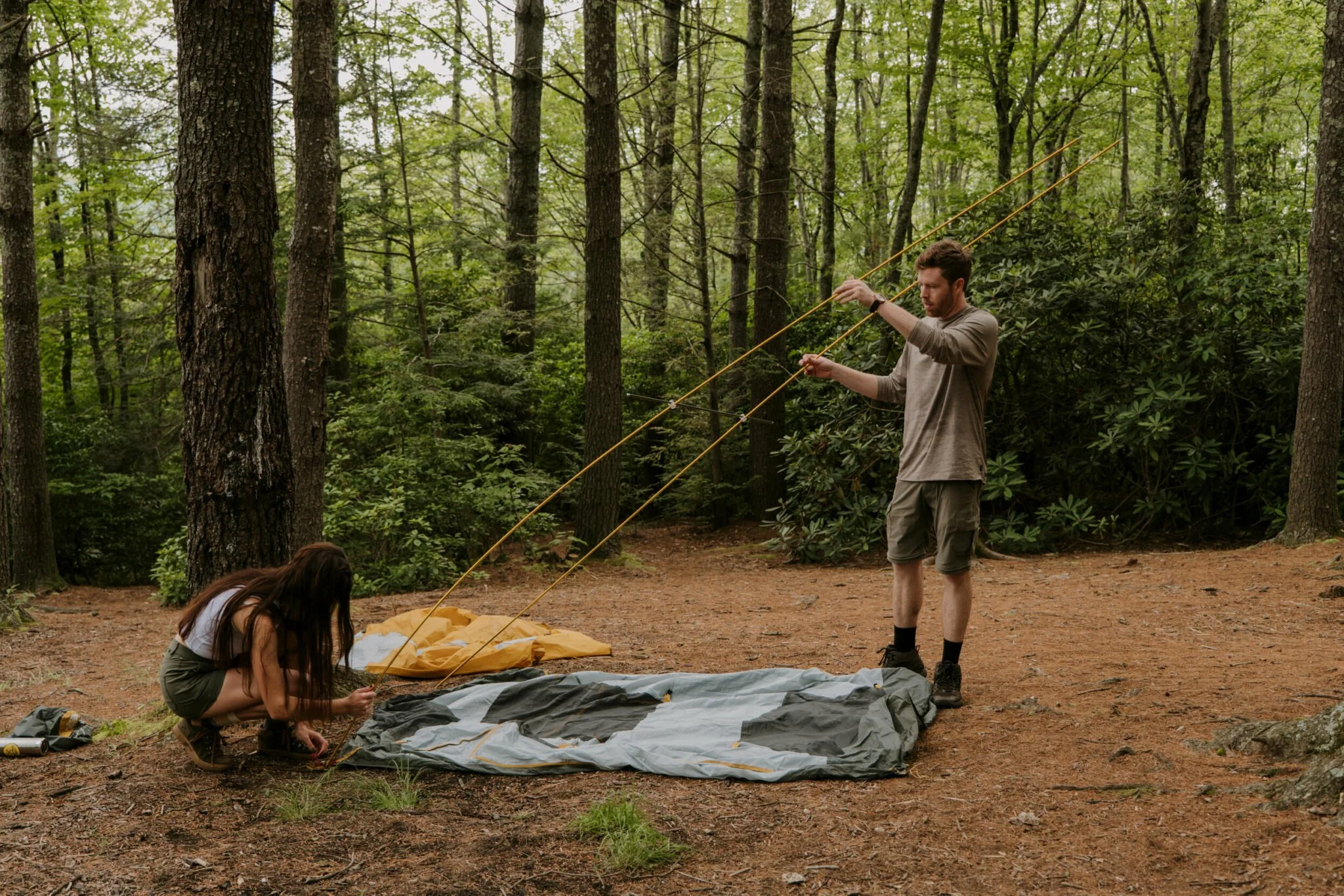 North-Carolina-Forest-Elopement-Setting-Up-Tent.jpg