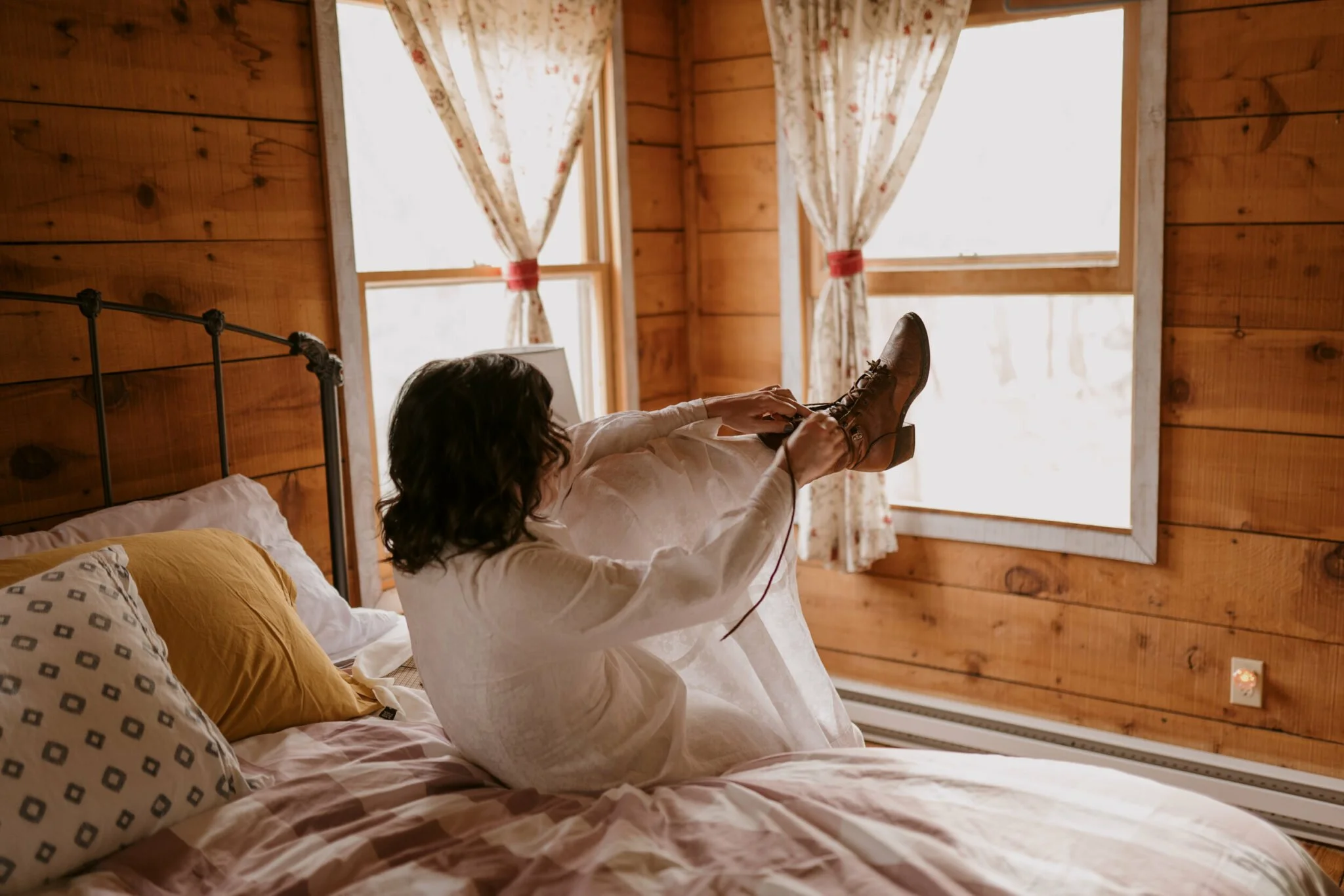 winter-elopement-lacing-up-boots.jpg