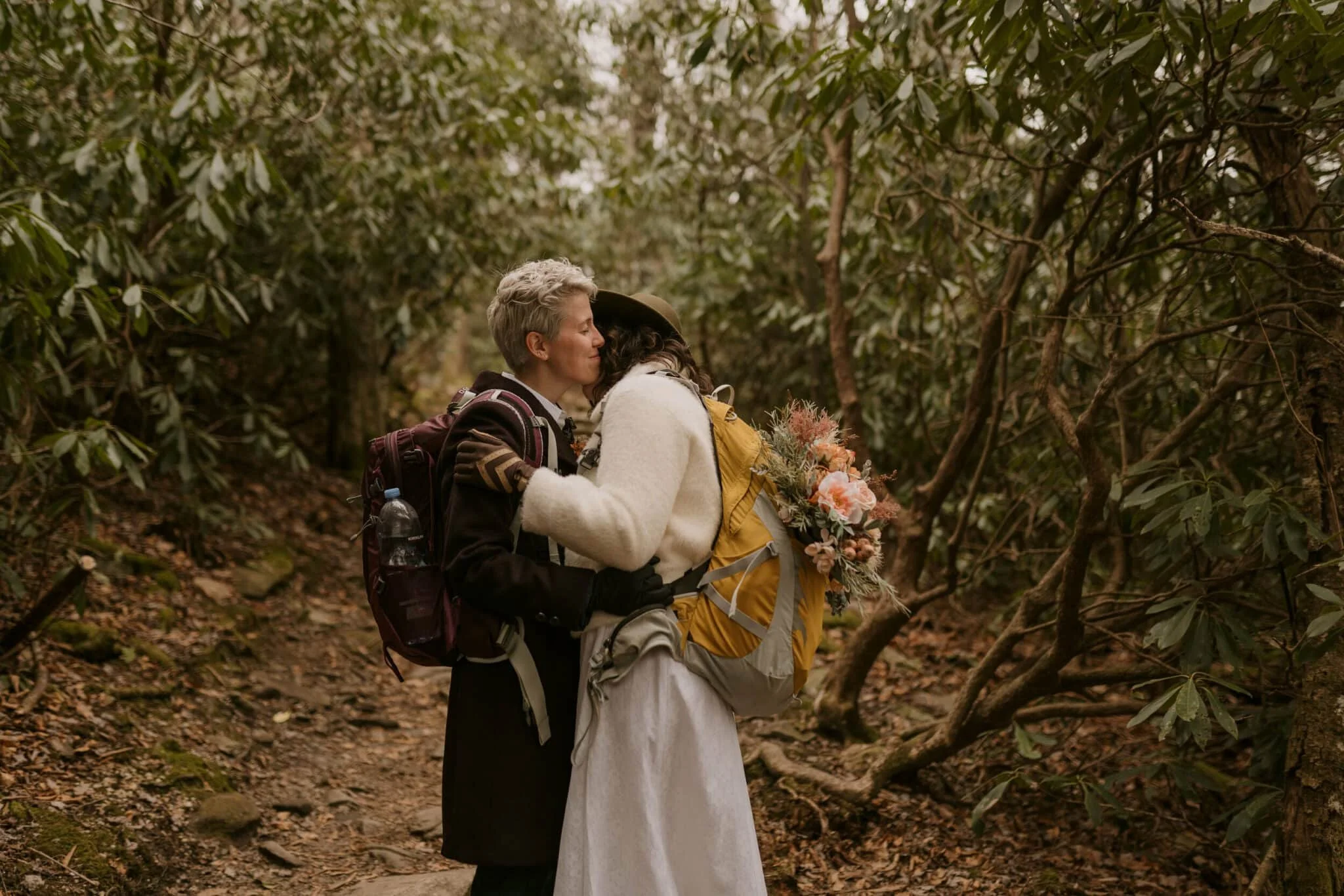 winter-elopement-rhododendron-hugs.jpg