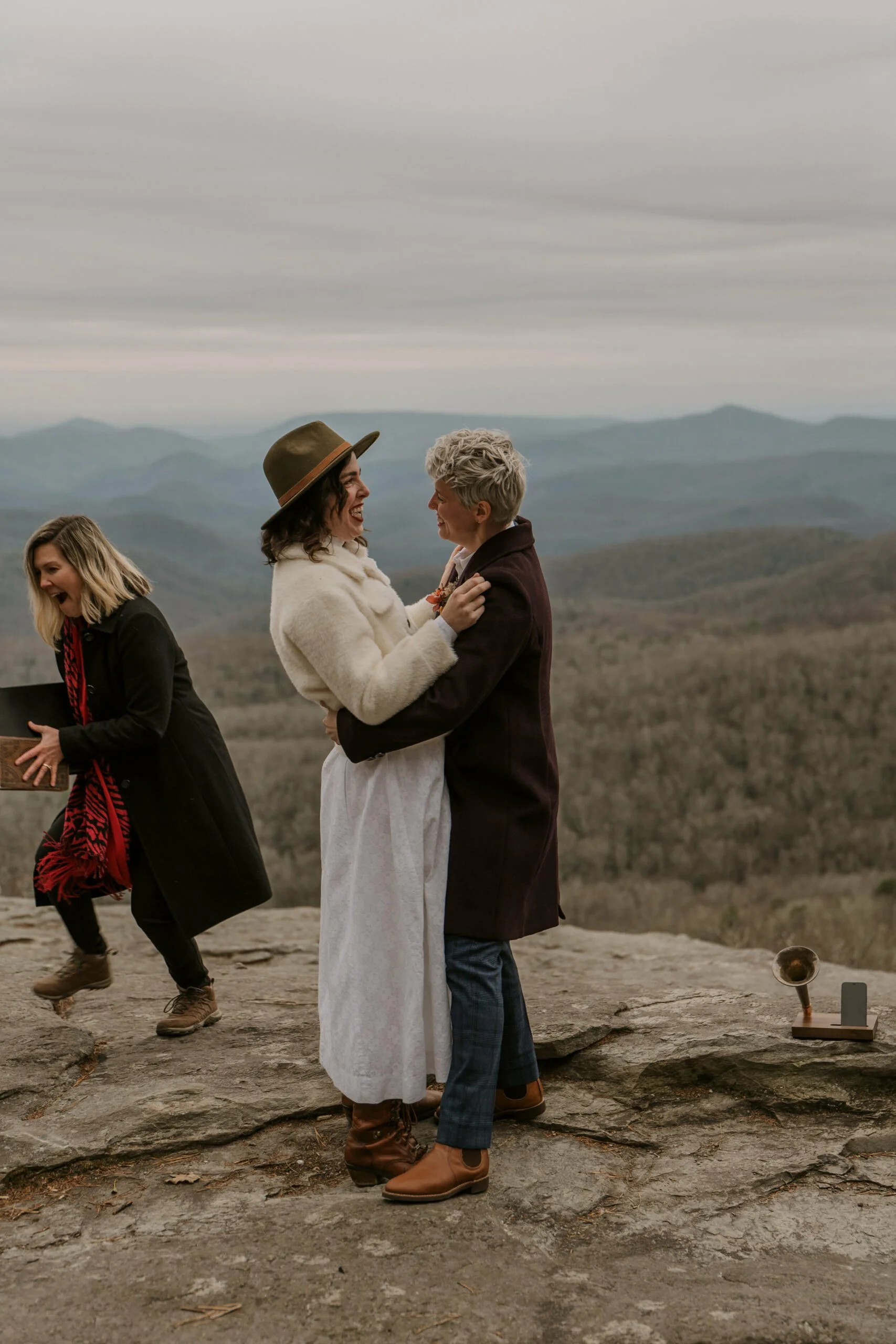 winter-elopement-excited-embrace-scaled.jpg
