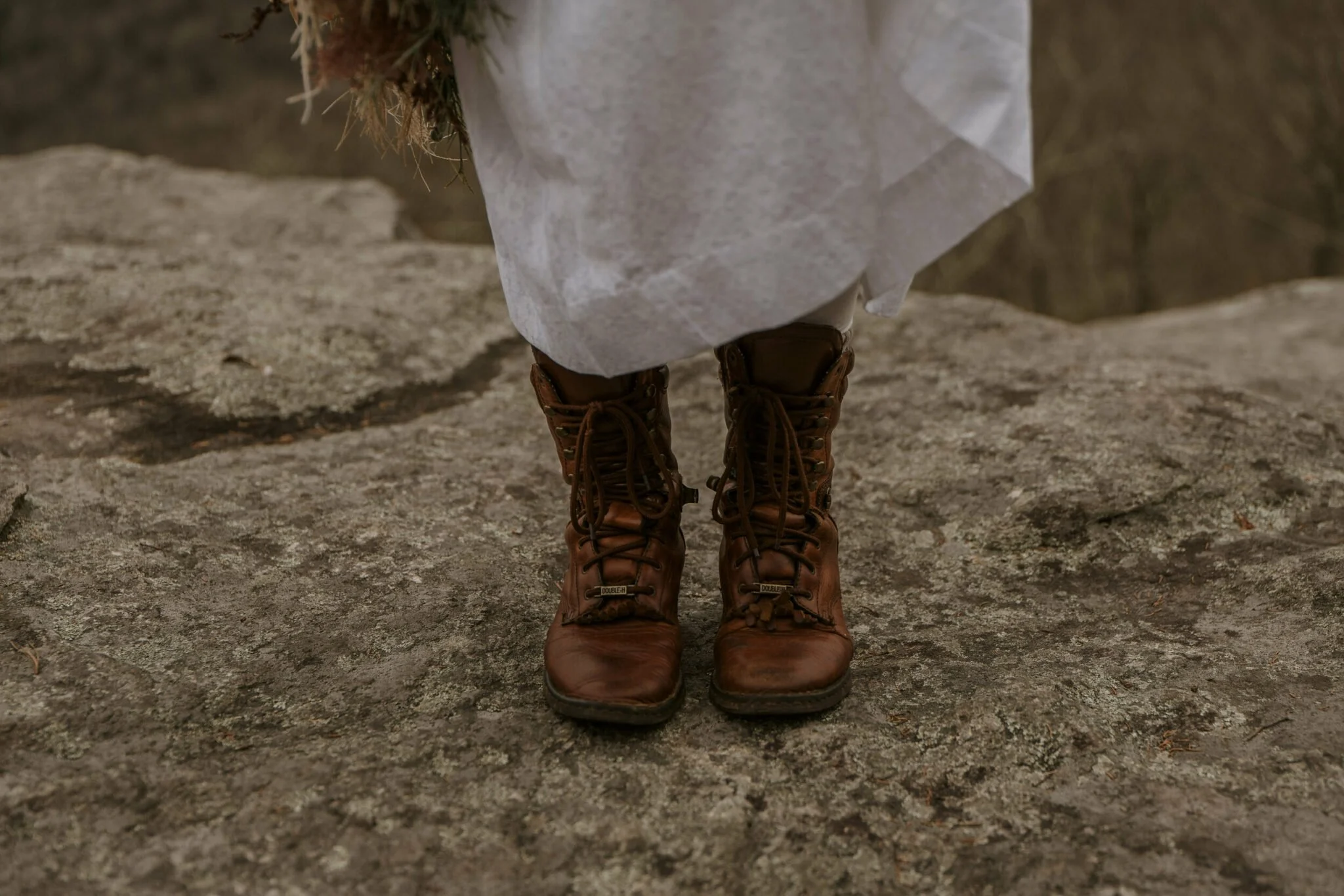 winter-elopement-boots-with-dress.jpg