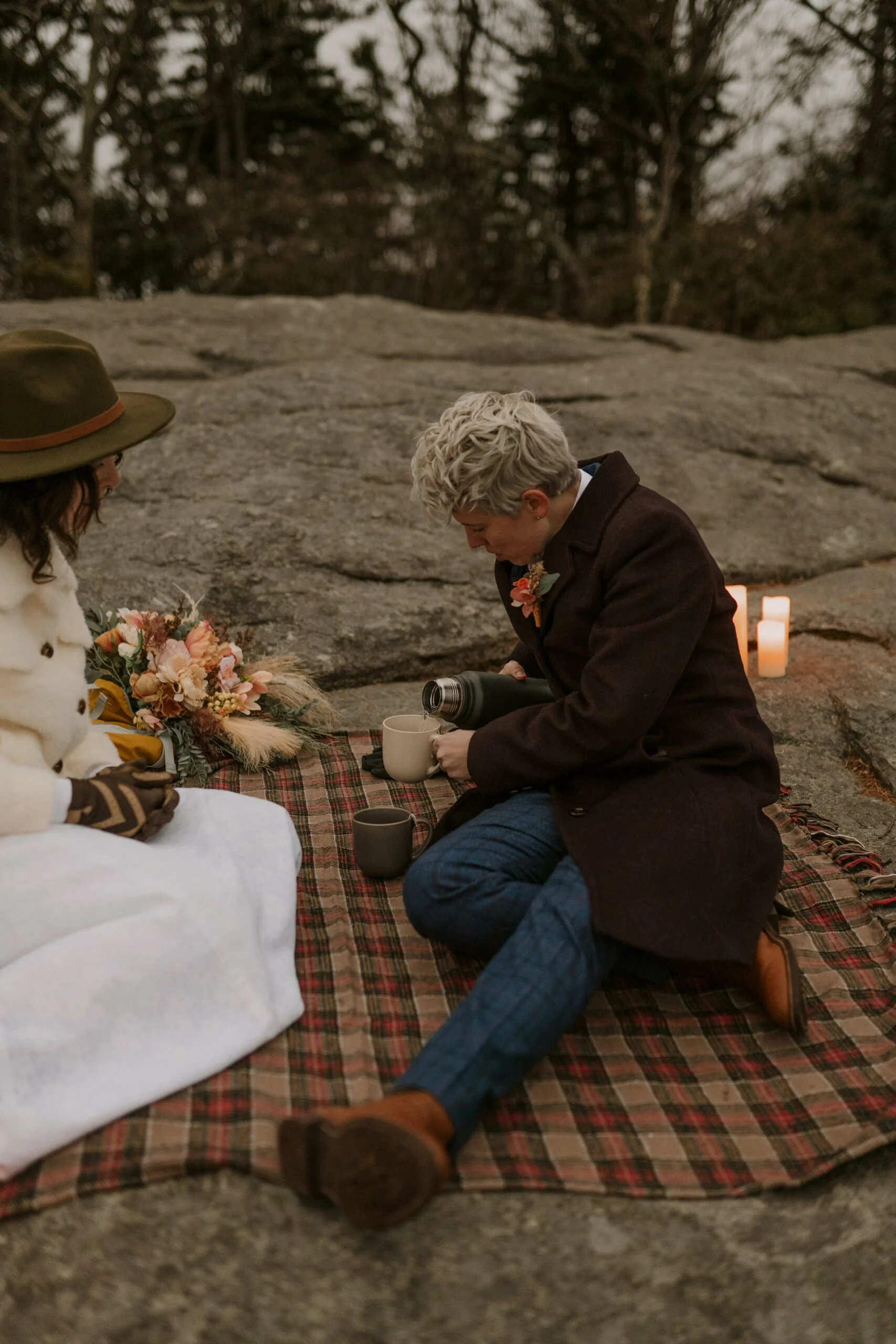 winter-elopement-pouring-tea-scaled.jpg