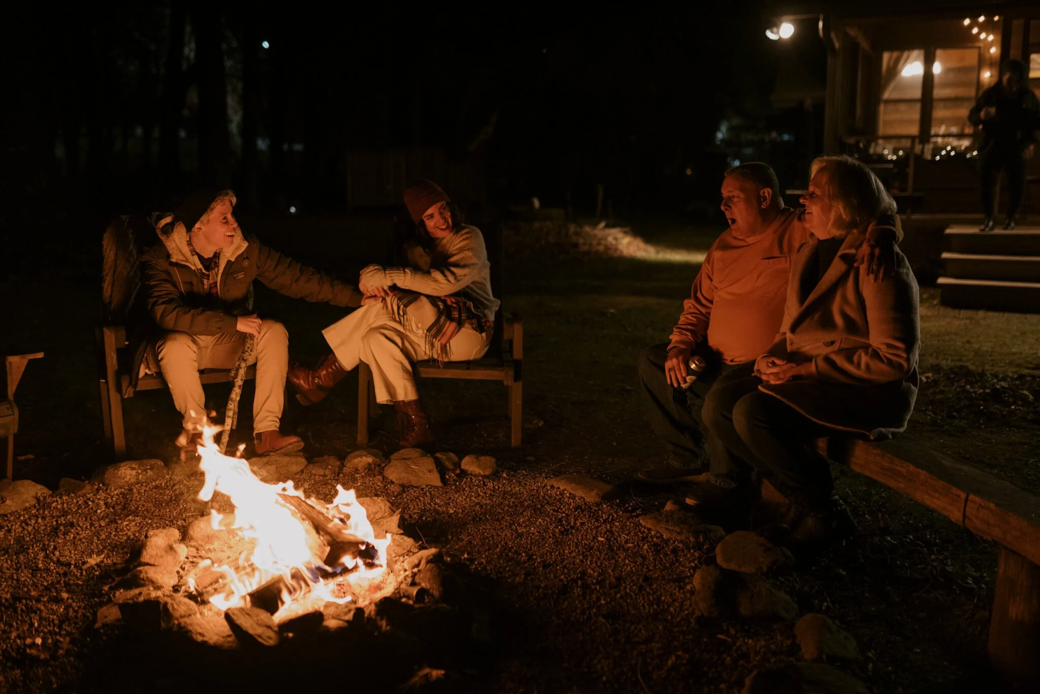 winter-elopement-talking-by-fire.jpg