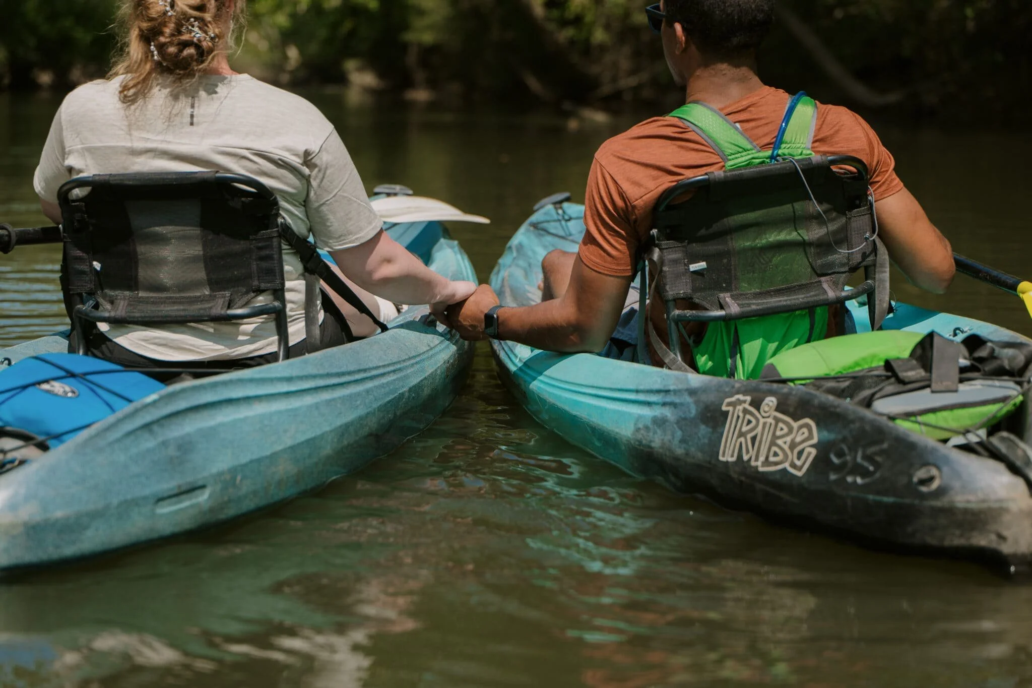 North Carolina Adventure Elopement Kayaking Holding Hands.jpg