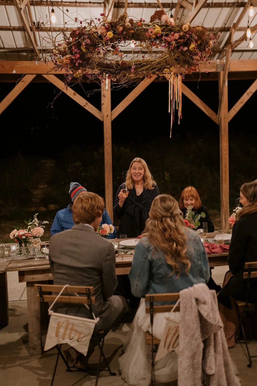 A post elopement party scene takes place with speeches at a table