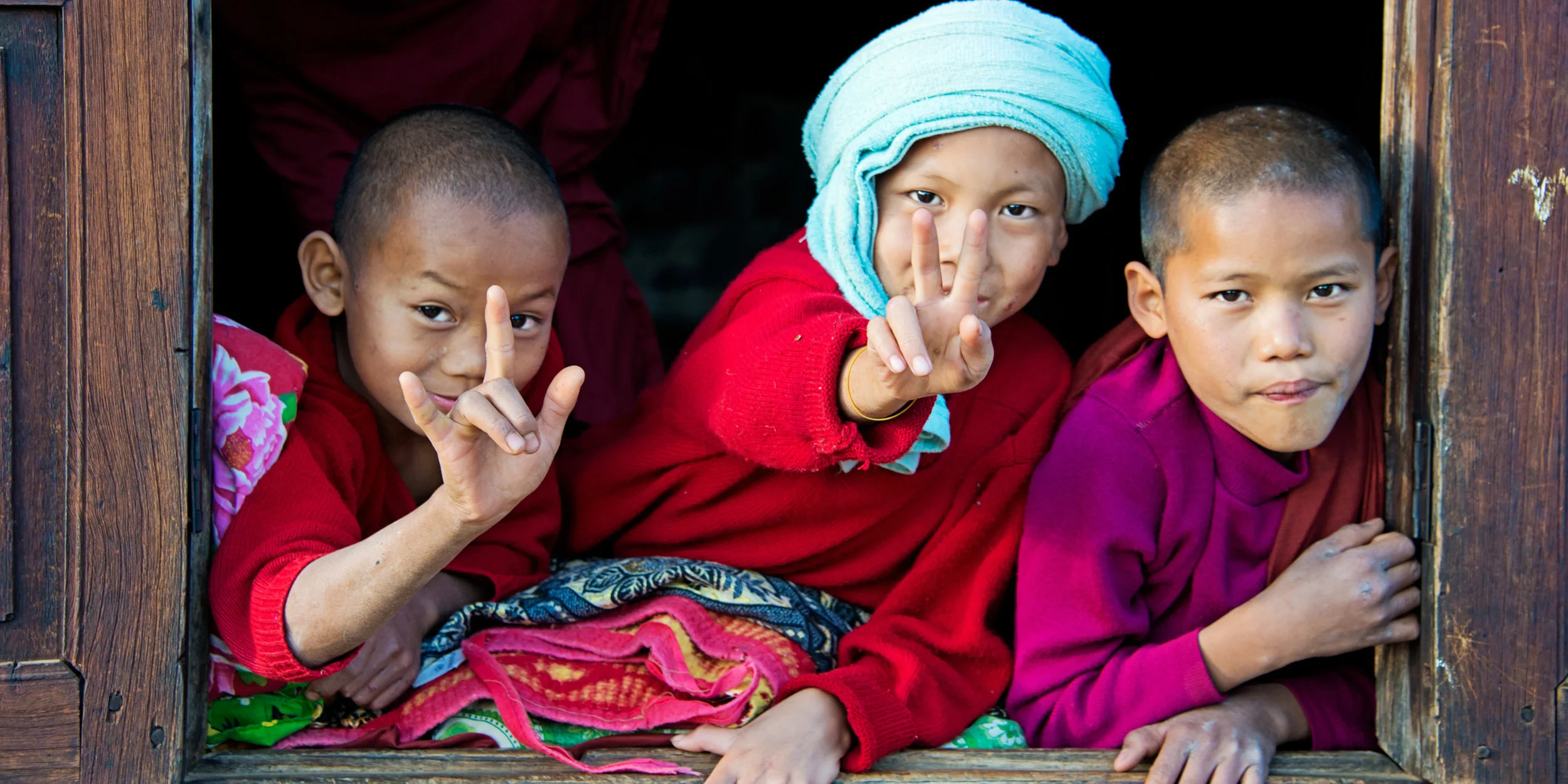 burmese_monks_peace_love_sign_web.jpg