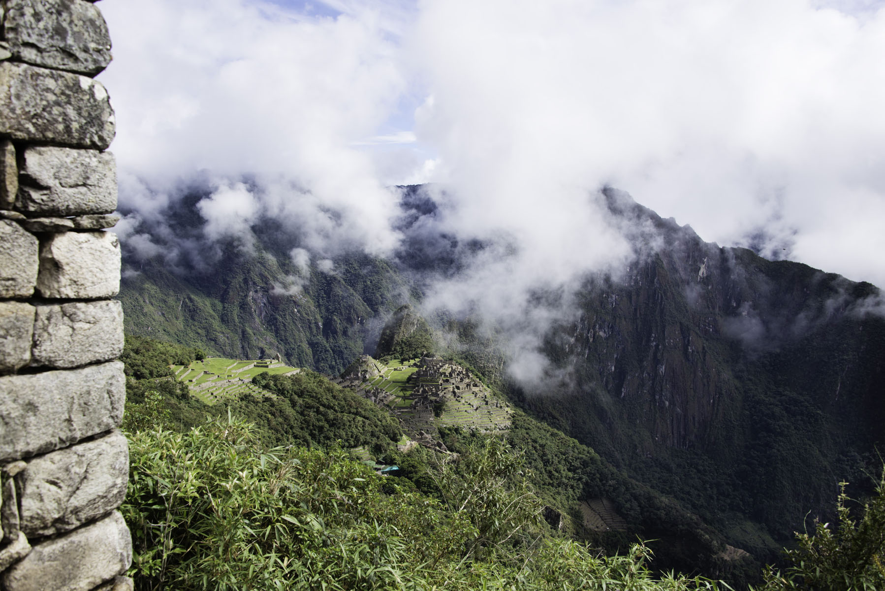 Distant View of Machu Picchu City in the Clouds