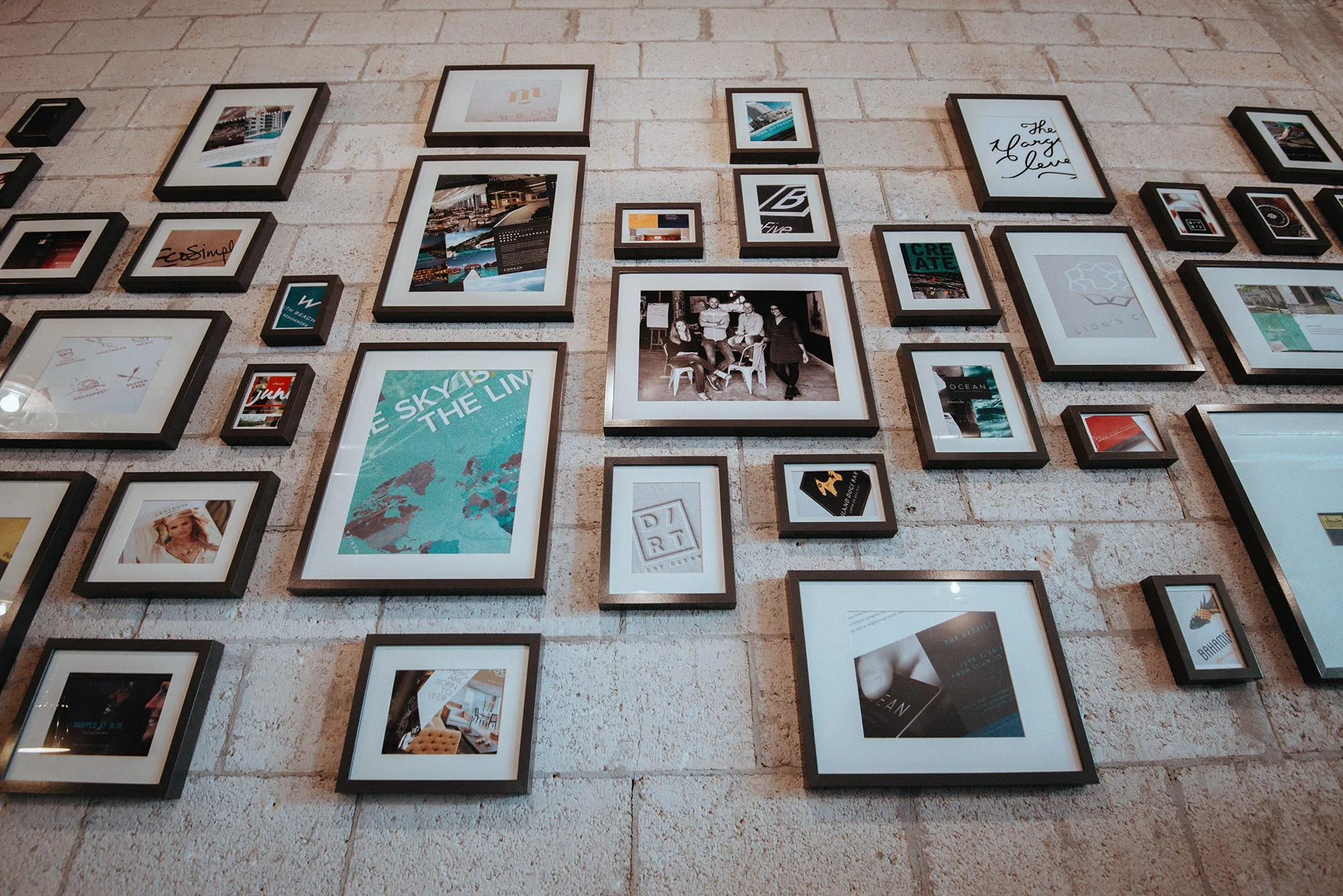 creative office gallery wall