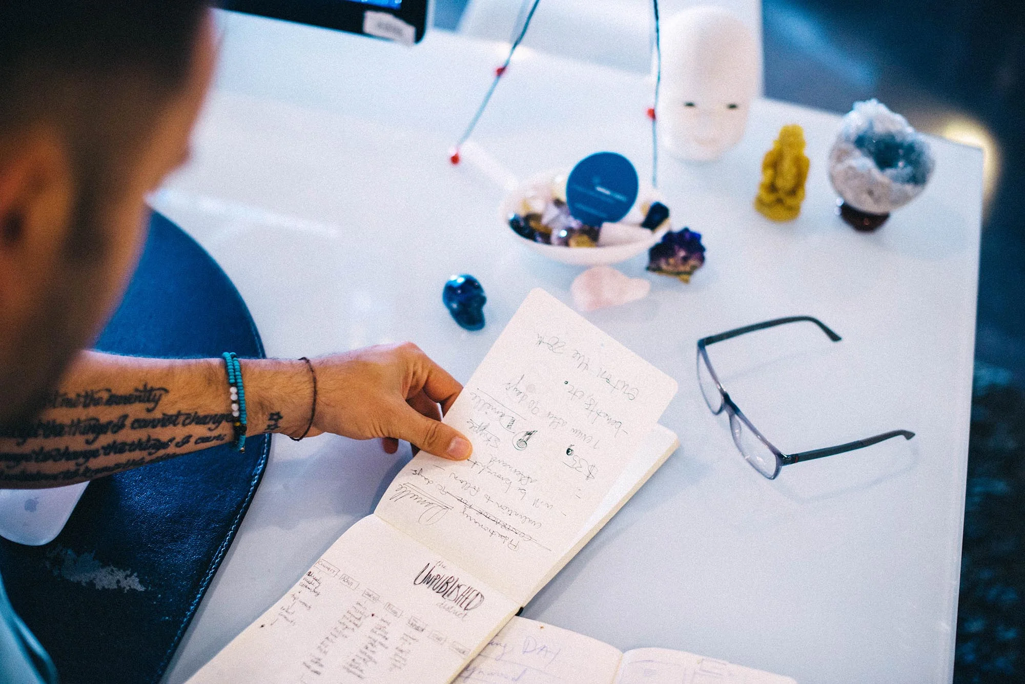 graphic designer looking at notebook