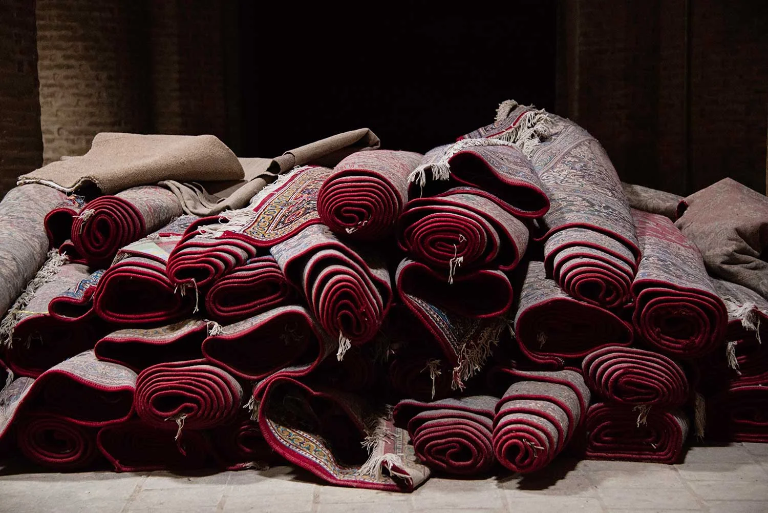Pile of Rolled Rugs