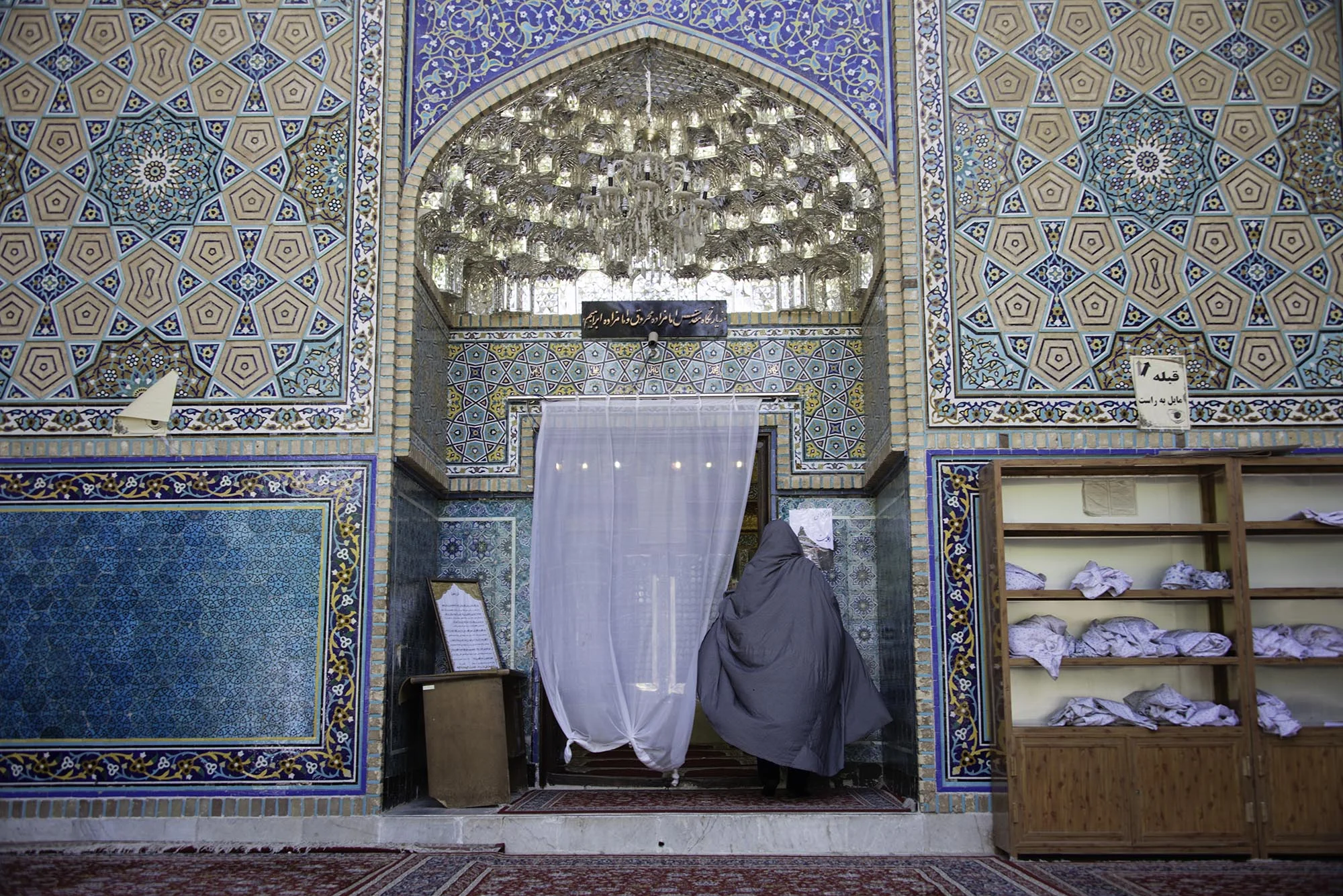 Woman In Burka Entering Mosque