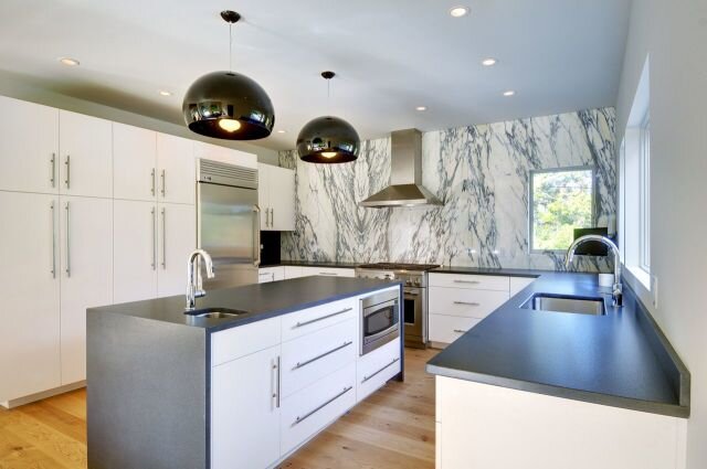 oyster-shores-contemporary-barn-home-sleek-kitchen-e1437580722774.jpg