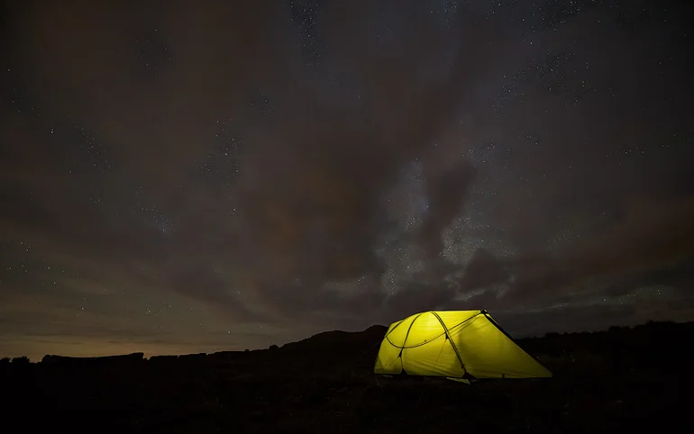 My tent under the night sky at our camp at Ribbon Falls. You can just see the top of the Eastern buttress to the left of the picture.